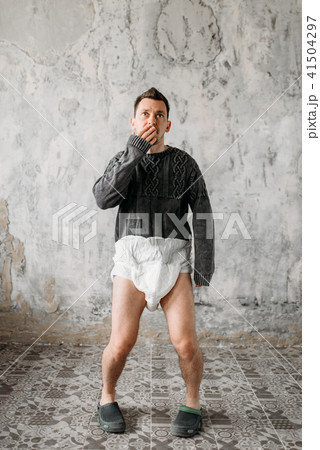 Freak man in diaper wrapped in packaging film 41504297