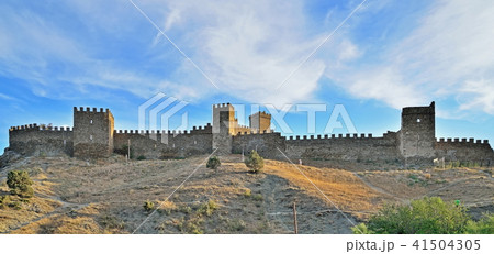 Genoese fortress at sunset in the sun Genoese fortress at sunset in the sun 41504305