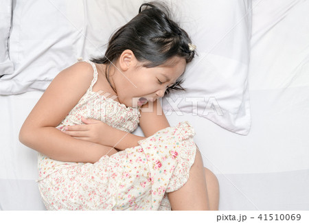 asian child suffering from stomachache 41510069