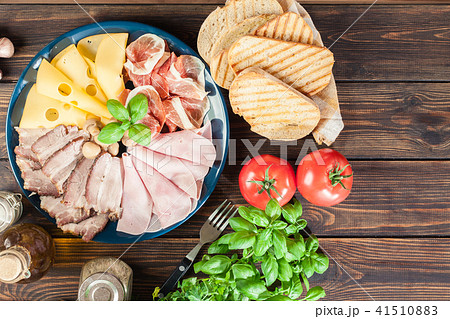 Cold meat platter with ham, prosciutto and other Cold meat platter with ham, prosciutto and other 41510883