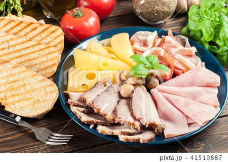 Cold meat platter with ham, prosciutto and other Cold meat platter with ham, prosciutto and other 41510887