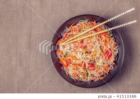 Glass noodle salad with cucumber pepper and carrot Glass noodle salad with cucumber pepper and carrot 41513386