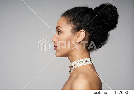 Beauty profile portrait of beautiful mixed race woman wearing chocker 41520085