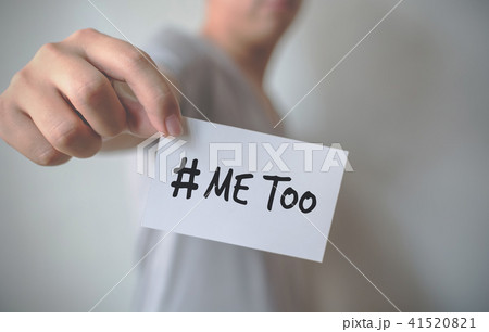 Close up hand of young man holding card with word 41520821