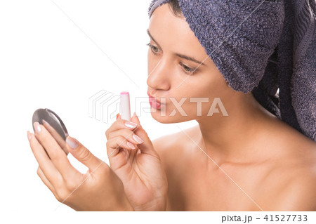 Woman Applying Hygienic Lip Balm Woman Applying Hygienic Lip Balm 41527733