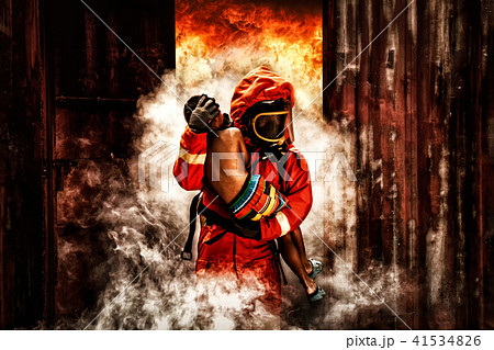 fireman save a child in arms from fire incident 41534826