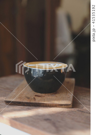 Cappuccino coffee break on wood background 41535192