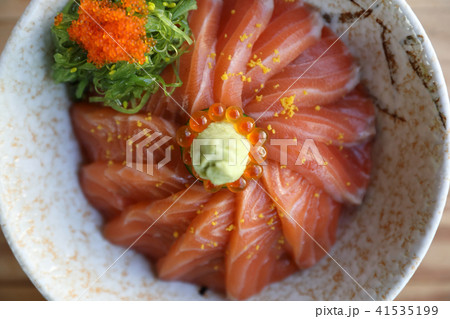 Salmon sushi don on wood background , Japanese food Salmon sushi don on wood background , Japanese food 41535199