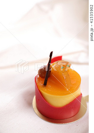 Mango fancy cake with strawberry chocolate isolated in white background Mango fancy cake with strawberry chocolate isolated in white background 41535902