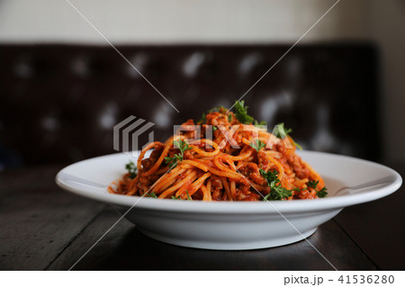 Spaghetti bolognese on wood background , italian food Spaghetti bolognese on wood background , italian food 41536280