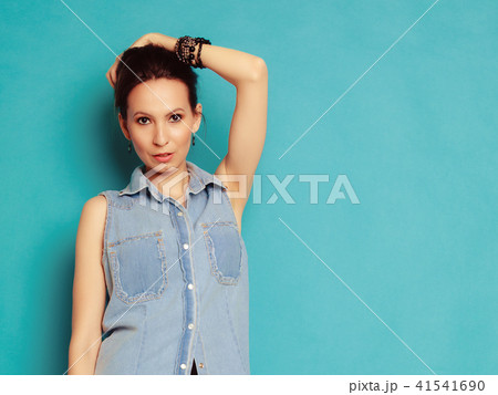 Summer fashion. Portrait of girl in jeans shirt. 41541690