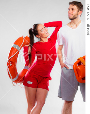 lifeguard couple with rescue equipment lifeguard couple with rescue equipment 41541851