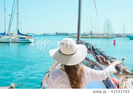 Beautiful Young Caucasian Woman in Hat at Ocean 41543703