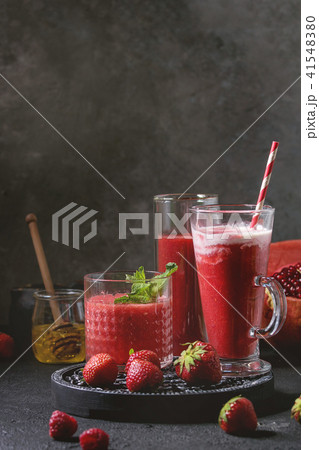 Red fruit cocktails or smoothies Red fruit cocktails or smoothies 41548380