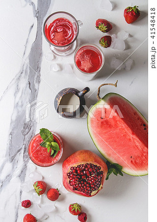 Red fruit cocktails or smoothies Red fruit cocktails or smoothies 41548418