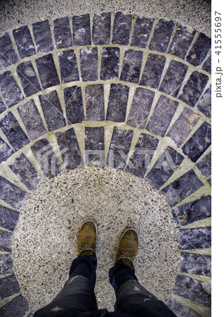 Feet on cobblestones 41555697