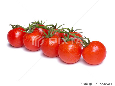 Fresh cherry tomatoes with water drops isolated on white background Fresh cherry tomatoes with water drops isolated on white background 41556584