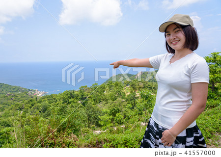 Women tourist on viewpoint at Koh Tao Women tourist on viewpoint at Koh Tao 41557000