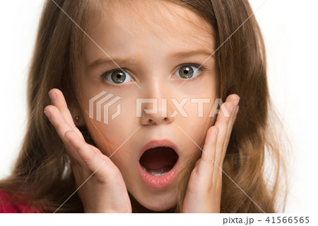 Beautiful teen girl looking suprised isolated on white 41566565