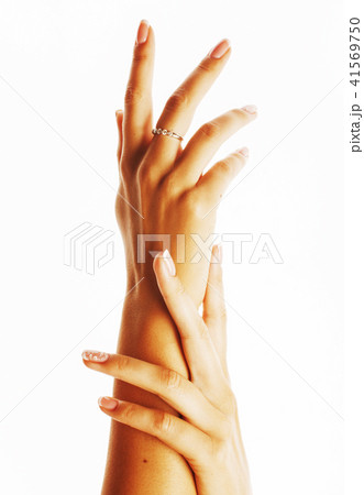 beauty delicate hands with manicure holding flower lily close up beauty delicate hands with manicure holding flower lily close up 41569750