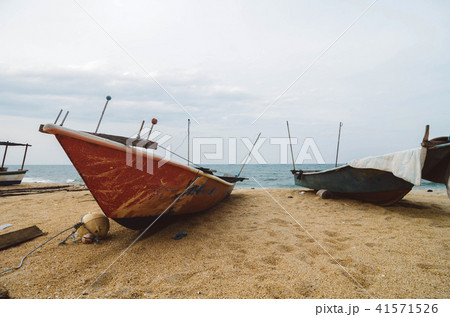 traditional fisherman fiber boat on the beach sand 41571526
