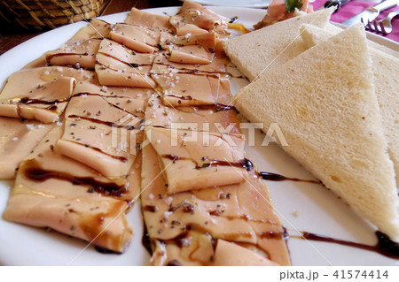 slice raw foie gras with sea salt slice raw foie gras with sea salt 41574414