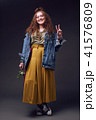 Happy hippy girl, studio shot 41576809