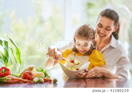 Happy family in the kitchen. Happy family in the kitchen. 41580229