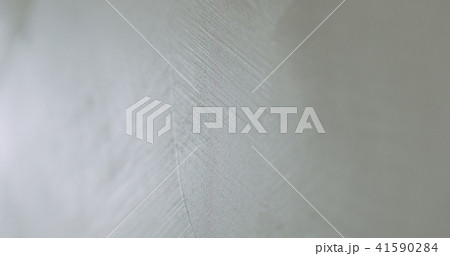 closeup applying decorative concrete plaster on the wall closeup applying decorative concrete plaster on the wall 41590284