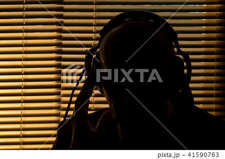 FBI secret agent listens and records the conversat 41590763