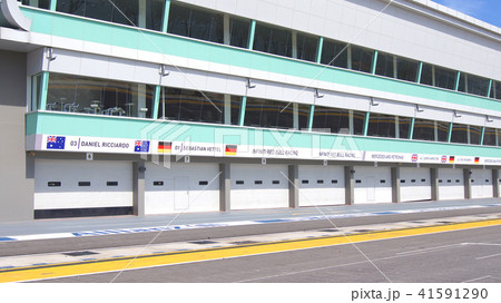 SINGAPORE - APR 2nd 2015: Pit lane and start finish line of the Formula One Racing track at Marina SINGAPORE - APR 2nd 2015: Pit lane and start finish line of the Formula One Racing track at Marina 41591290