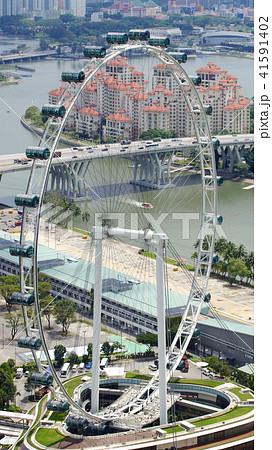 SINGAPORE - APR 2nd 2015: Aerial view of Singapore Flyer and pit lane of the Formula One Racing 41591402