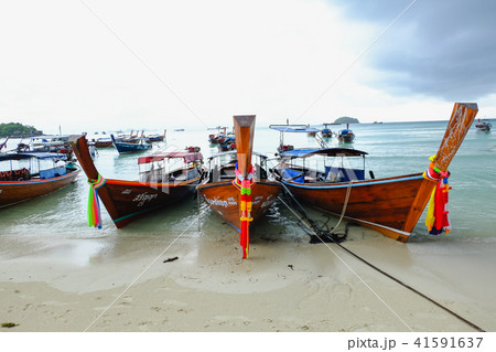 the beach and boat at the lipe island in the mo 41591637