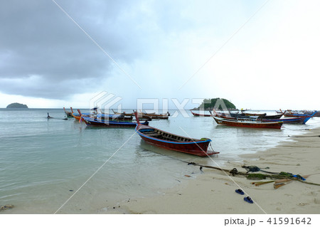 the beach and boat at the lipe island in the mo the beach and boat at the lipe island in the mo 41591642