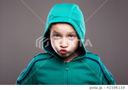 child boy.funny grimace emotion kid child boy.funny grimace emotion kid 41596139