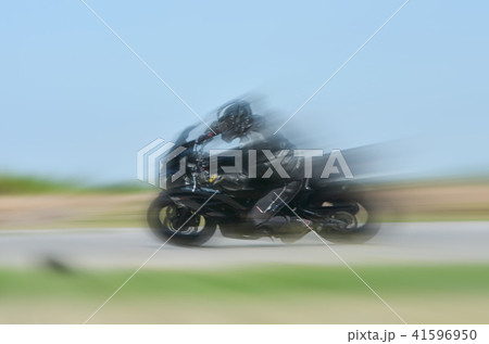 motion blur of the of a motorcycle racing running motion blur of the of a motorcycle racing running 41596950
