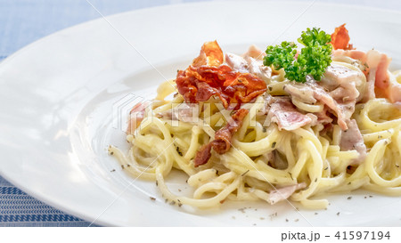 Spaghetti carbonara on dish 41597194