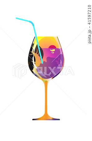 Girl drinks through a straw from a orange glass 41597210