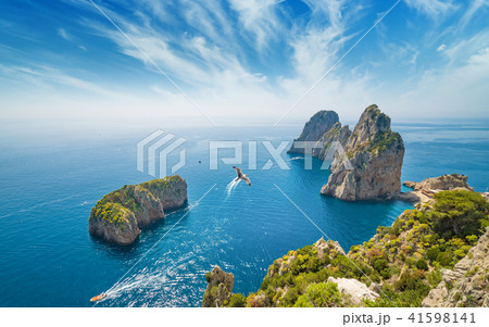 Famous Faraglioni rocks, Capri island, Italy 41598141