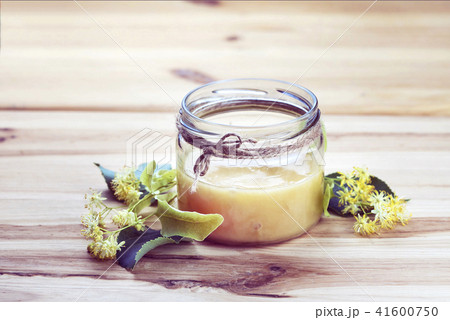 Honey and flowers of linden lime tree 41600750