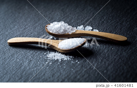 Different types of salt. Top view on wooden spoons 41601481
