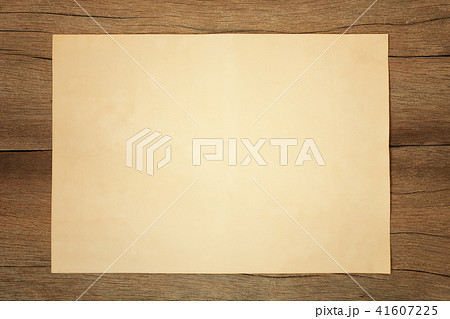 Old blank paper on vintage wooden floor and have copy space. Old blank paper on vintage wooden floor and have copy space. 41607225