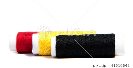 Colorful spools of thread isolated on white  41610645