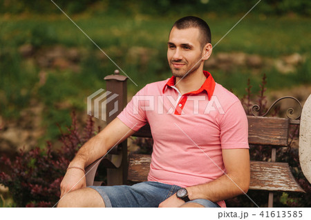 Guy in polo smile to photographer Guy in polo smile to photographer 41613585
