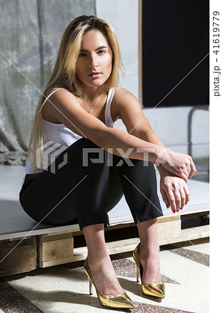 Czech Blonde Teen Girls - Young blonde beautiful girl sit on high heels - Stock Photo [41619779] -  PIXTA