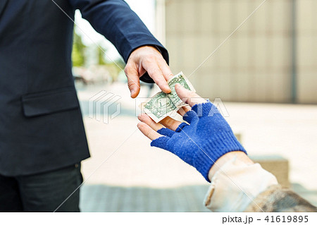 Poor starving refugee asking for any help 41619895