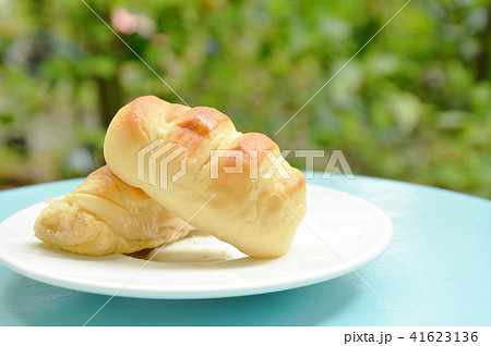 bread stuffed pork sausage on white dish bread stuffed pork sausage on white dish 41623136
