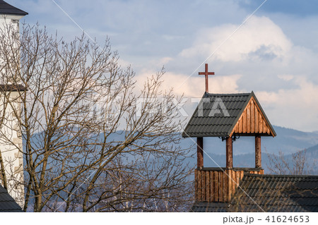 Cross on a wooden rooftop Cross on a wooden rooftop 41624653