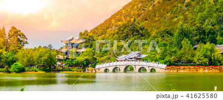 Suocui Bridge over Black Dragon Pool at Moon Embracing Pavilion in Jade Spring Park, Lijiang, China 41625580
