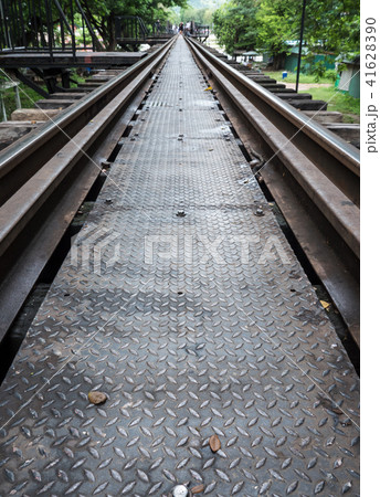 Metal pathway on the old railway bridge. Metal pathway on the old railway bridge. 41628390